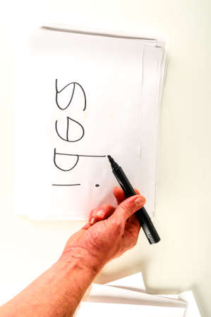 Close-up of sheet with drawing Object on a White Backgroundの写真素材