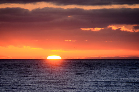 Cloudscape, Colored Clouds at Sunset near the Oceanの写真素材