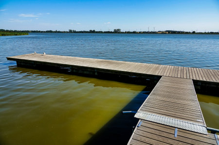 pier on the lake , image taken in west poland, east europe