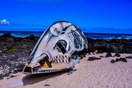 Sailboat stranded on the beach after a stormの写真素材