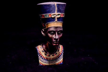 A statue of a woman with a crown on her headの写真素材