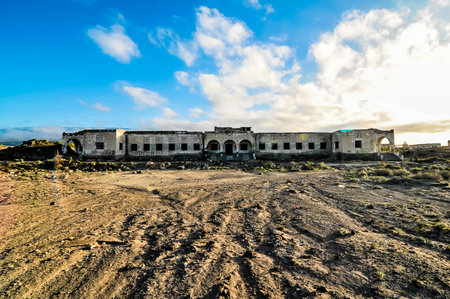 Abandoned Buildings of a Military Base at Sunsetの写真素材