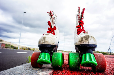 Old Vintage White Skate Boot on the Asphalt Streetの写真素材