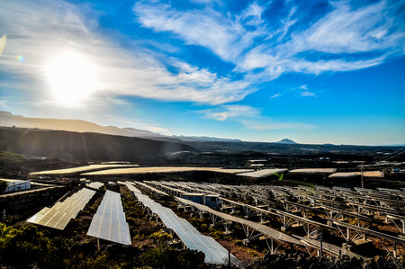 Renewable Energy Concept Solar Panels Field at Sunsetの写真素材