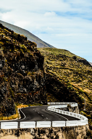 Long Empty Desert Asphalt Road in El Hierro Canary Islands Spainの写真素材