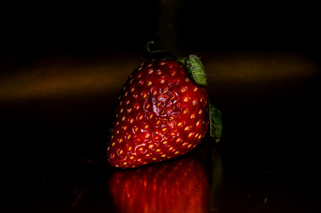 Fresh Ripe Strawberry Fruit on a Colored Backgroundの写真素材