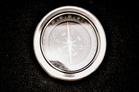Vintage Classic Compass on a Black Backgroundの写真素材