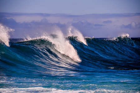 Big Blue Wave Breaks in the Atlantic Oceanの写真素材