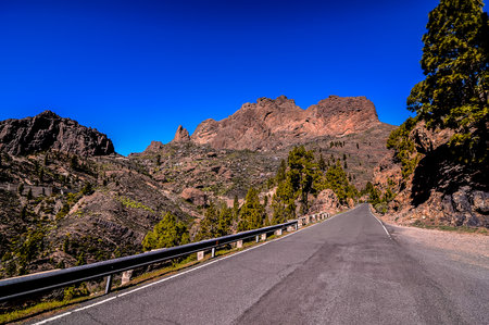 Long Empty Desert Asphalt Road in Canary Islands Spainの写真素材