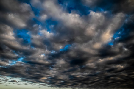 Cloudscape, Colored Clouds at Sunset near the Oceanの写真素材