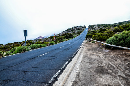 Road on Cloudy Day in El Teide National Park Tenerife Canary Islands Spainの写真素材