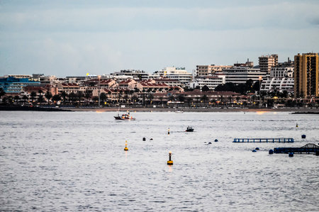 Los Cristianos Ocean Town in South Tenerife at Duskの写真素材