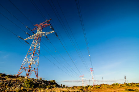 Energy Electricity Power Pylon on a Blue Skyの写真素材