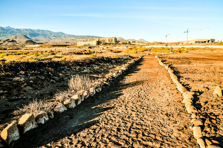 Dirt Road through the Desert in Tenerife Island Spainの写真素材