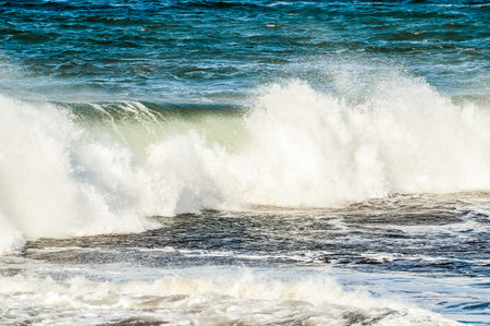 Big Blue Wave Breaks in the Atlantic Oceanの写真素材