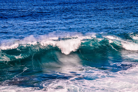 Big Blue Wave Breaks in the Atlantic Oceanの写真素材