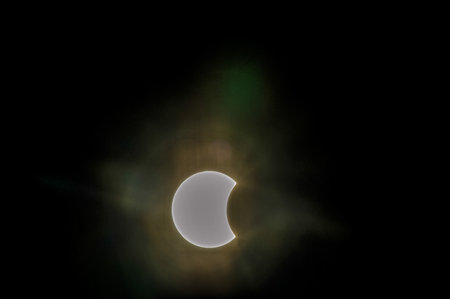 A large white moon is in the sky. The moon is surrounded by a dark sky. The moon is the main focus of the imageの写真素材