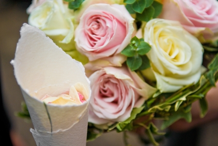 Confetti with wedding bouquetの写真素材