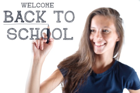 young beautiful woman with pen writing on screen  Caucasian model on white background の写真素材