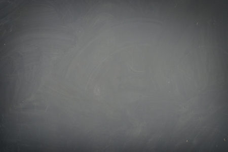 Blackboard ( chalkboard ) texture. Empty blank black chalkboard with chalk tracesの写真素材