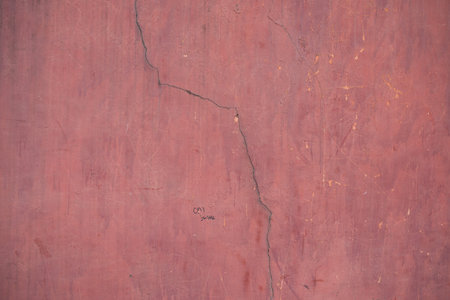 Red old vintage aged cement street rusty grunge rough wall surface background
