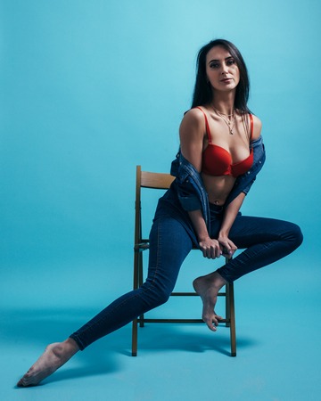 Portrait of young stylish fashion glamorous sexy brunette woman Jeans clothing.の写真素材