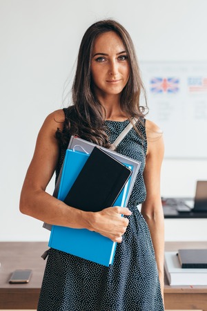 Female student smiling and looking at camera.の写真素材