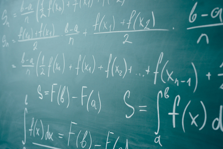 Math class. Algebra. The formulas are written on the school board