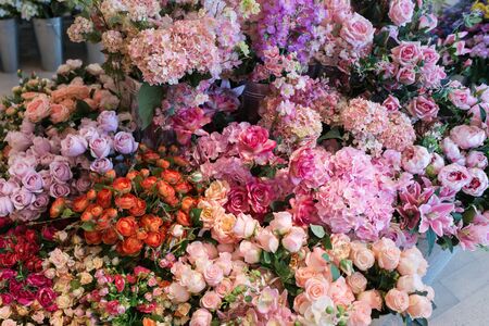 Many various pink and red flowers Pink rose flowers bouquet backgroundの写真素材