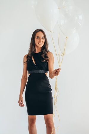 Beautiful Happy Young woman on birthday holiday party.の写真素材