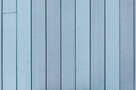 Background of vertical wooden panels. Fence, floor