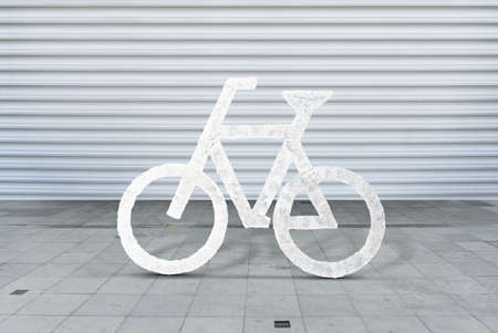White bicycle sign on asphalt bike cycling Concrete cement floor white stripped garage door backgroundの写真素材