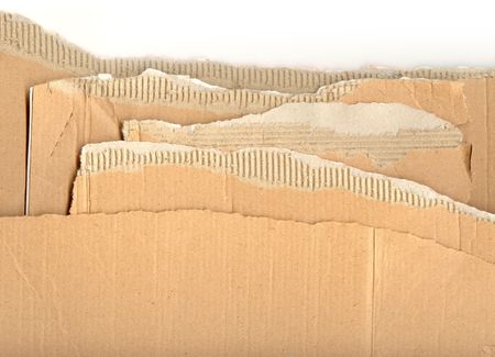 Ripped pieces of corrugated cardboard ready for you to use your design skills onの写真素材