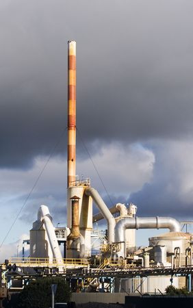 Fertiliser works against a stormy sky, Napier, New Zealandの写真素材