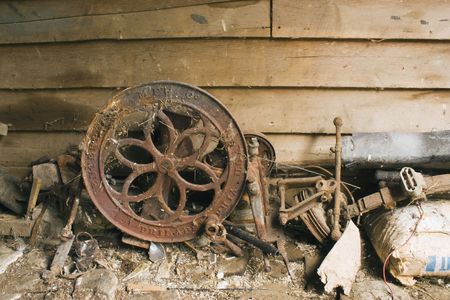 Piles of stuff against a shed wallの写真素材