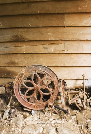 Piles of stuff against a shed wallの写真素材