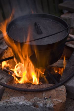 Cooking in a Dutch Oven over a fireの写真素材