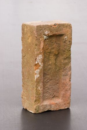 An old brick on dark backgroundの写真素材