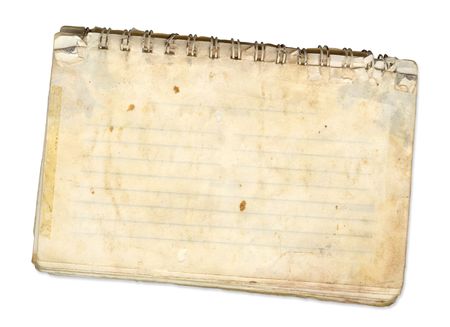 an old spiral bound pad used for recipesの写真素材