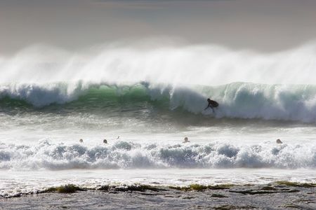Surfing the break at Haumoana Beach, Hawke's Bay, New Zealandの写真素材
