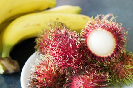 Fruit in Bangkok - bananas 10 Baht a bunch, Rambutan 15 Baht a Kilo.の写真素材