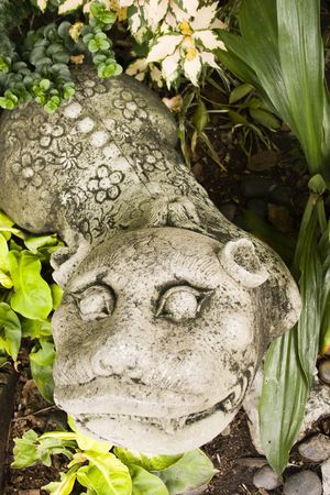 A sculpture in a garden in Bangkokの写真素材