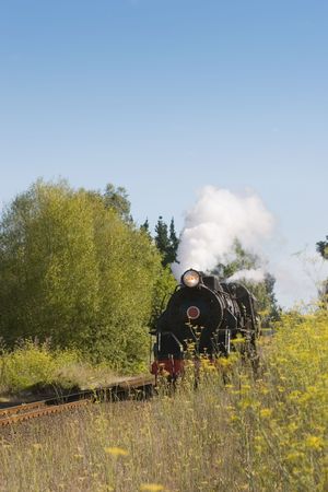 A steam train chugging through Hawke's Bay, New Zealandの写真素材
