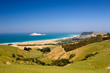 The view down to Bare Island and the coastal settlement of Waimarama in Hawke's Bay, East Coast of the North Island, New Zealand.の写真素材
