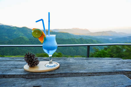 cocktail or mocktail drink and background mountain viewの写真素材