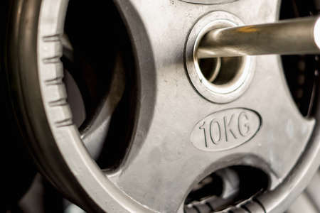 Weight lifting background in fitness or gym centerの写真素材