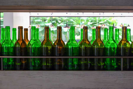 many bottle on the shelvesの写真素材