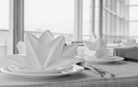 Luxury banquet table near window , Monochromeの写真素材