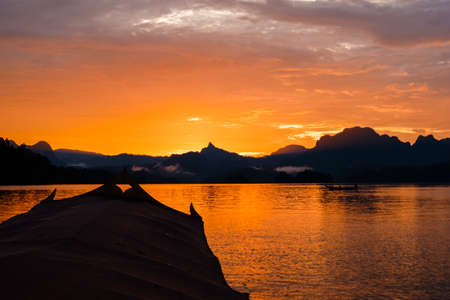 View point Mountain Floating in Rajjaprabha Dam (Cheow Lan Lake) at Khao Sok National Park, Surat thani Province Thailand, Sunset timeの写真素材