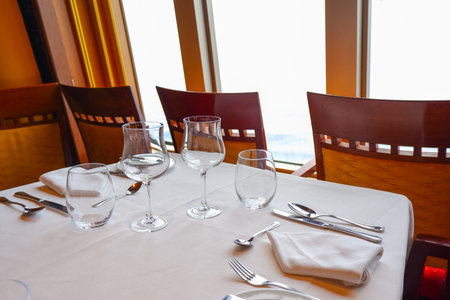 Luxury banquet table near windowの写真素材